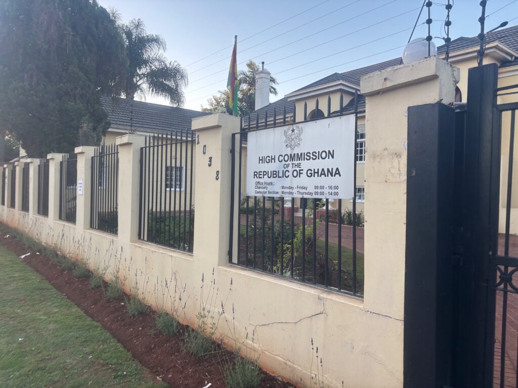 a fence with a sign on it