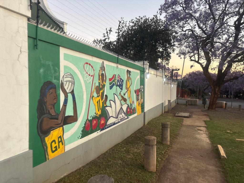 a wall with a painting on it