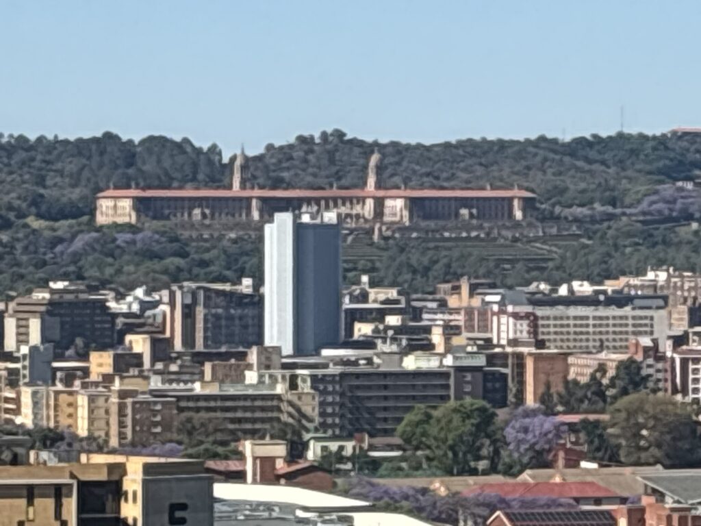 a city with trees in the background
