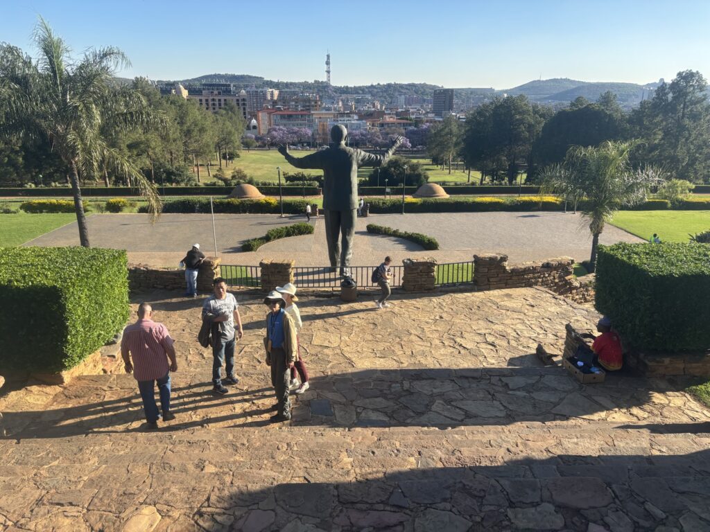 a group of people standing on a stone staircase